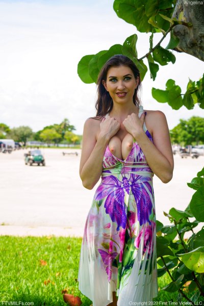 Amateur beauty Angelina strips her long dress in public & shows her big tits Gallery Cover Image